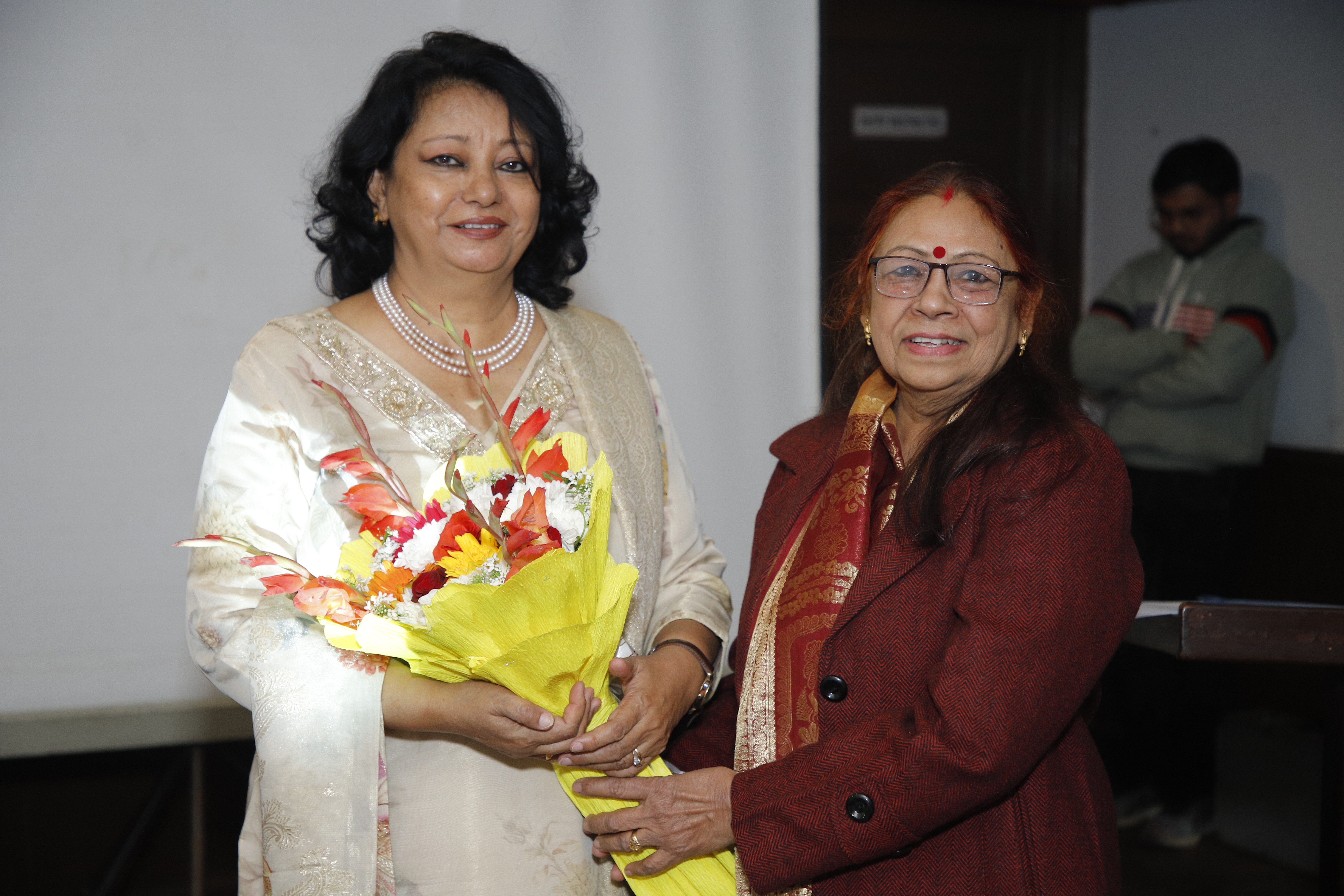 Mrs Sudha Kapoor welcomed by Mrs Savitri Singh